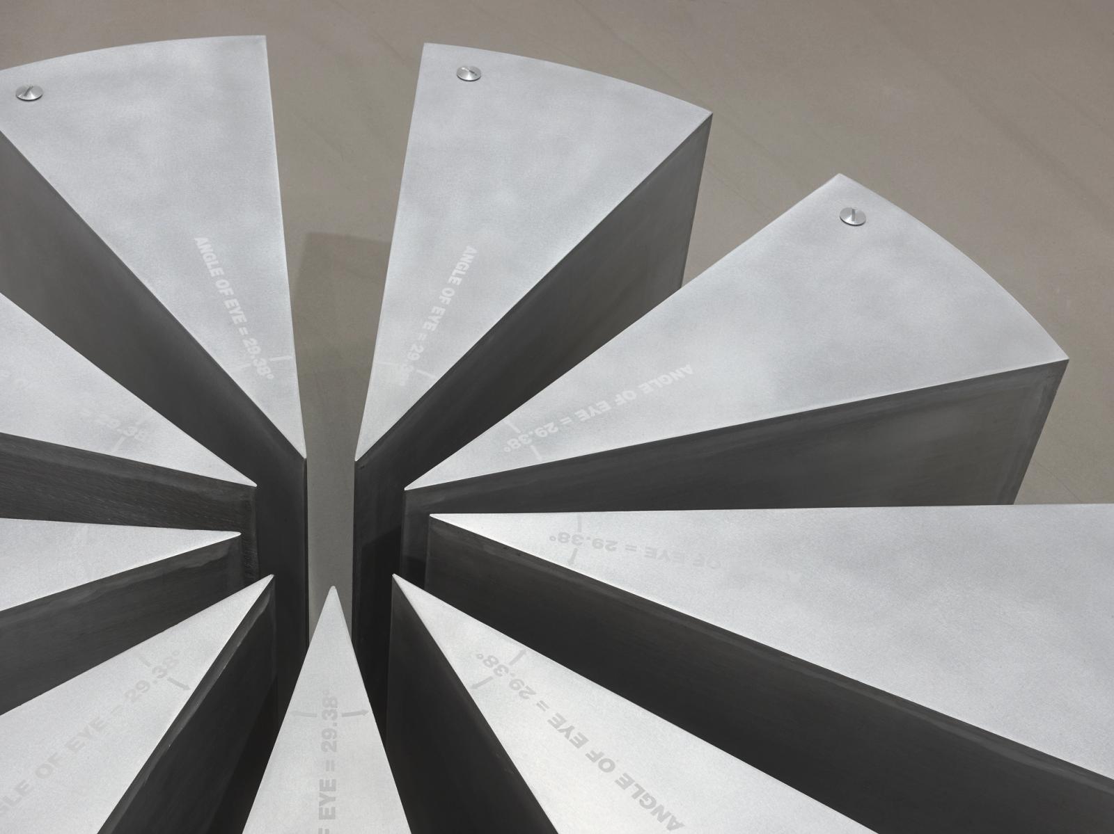 Michael Joo, Slanty, 1992. Aluminum, sandblasted text, synthetic tears, 24 × 60 × 60 in. Collection of the artist. Photo: Genevieve Hanson